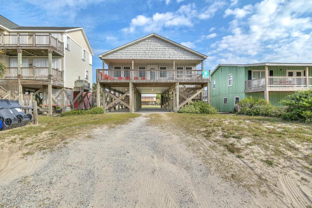 a view of a house from the road at No Worries in Oak Island
