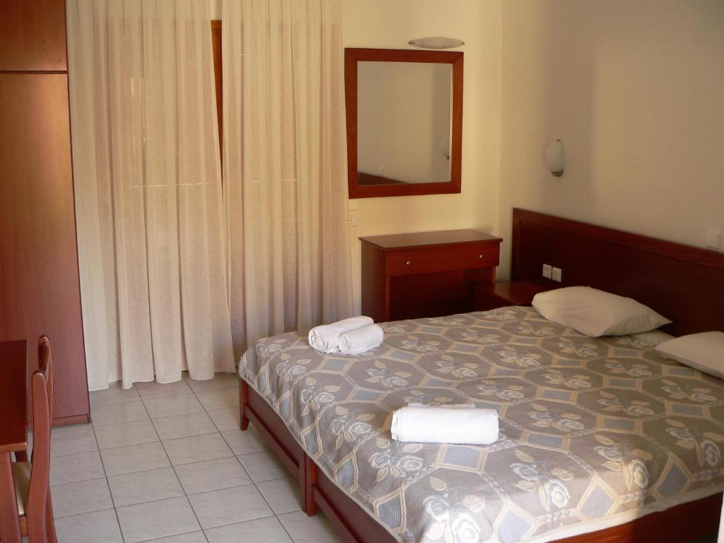 Voodi või voodid majutusasutuse Hotel Argo toas