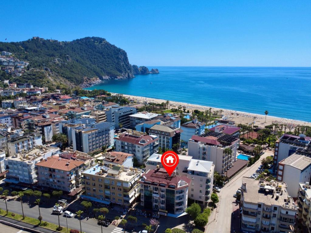 an aerial view of a city and the ocean at SA Apartments! 2BR Flat 100m to Cleopatra Beach in Alanya
