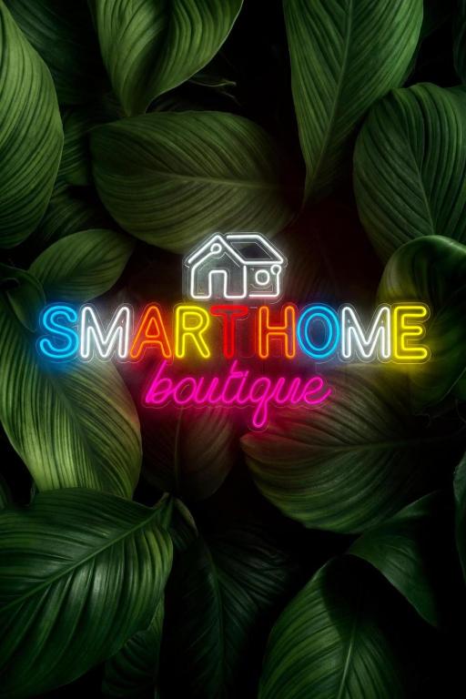a neon sign with the words marriot home boulevard at Smarthome Boutique, Collegno in Collegno