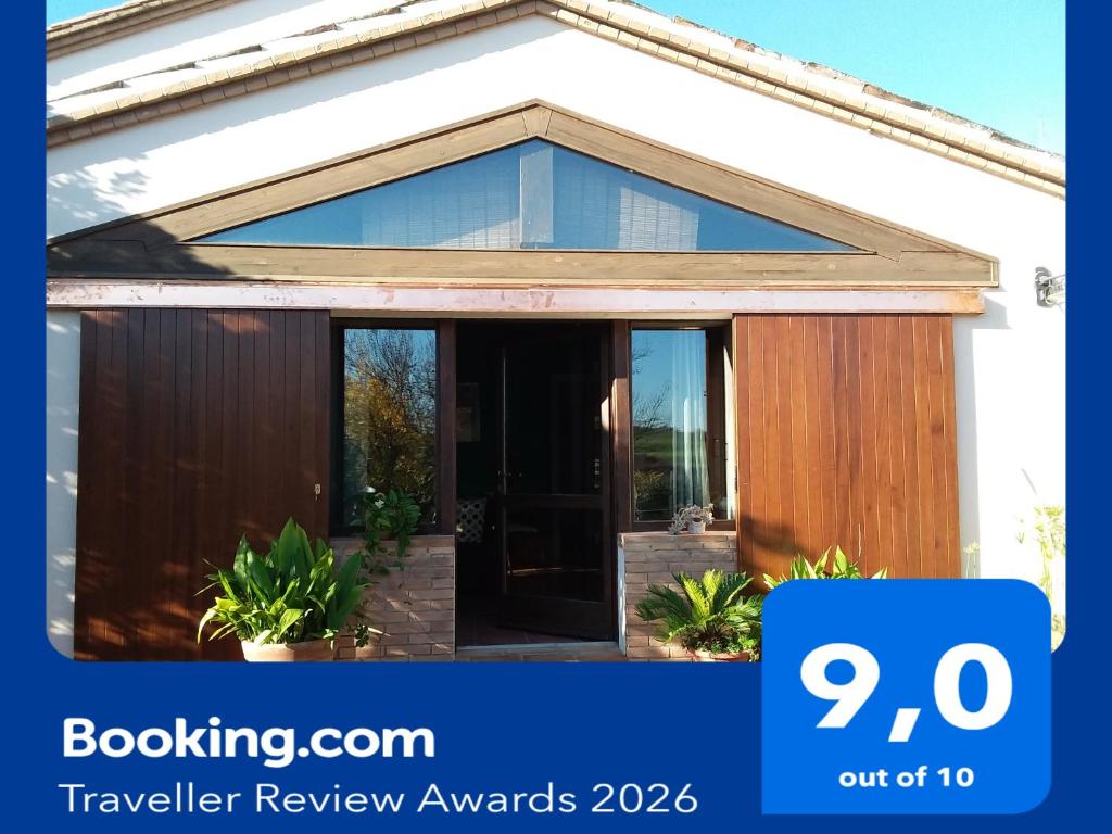 a house with a sliding glass door with a discount at I Tamerici in Saludecio