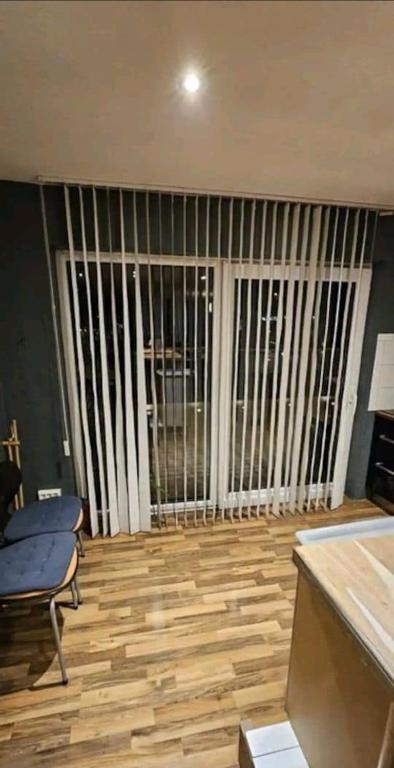 a living room with a large sliding glass door at Billet Senior in Fredrikstad