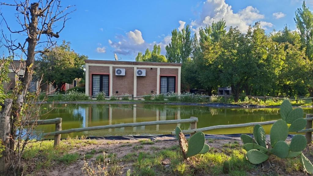 a house in the middle of a pond at Mariaflorales in San Rafael