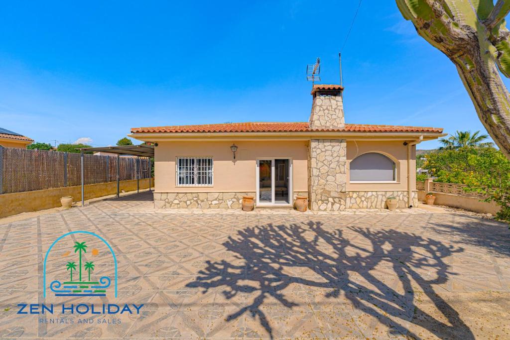 a small house with a brick driveway in front of it at Villa Reyets 4 bed 3 bath Private Pool in Busot