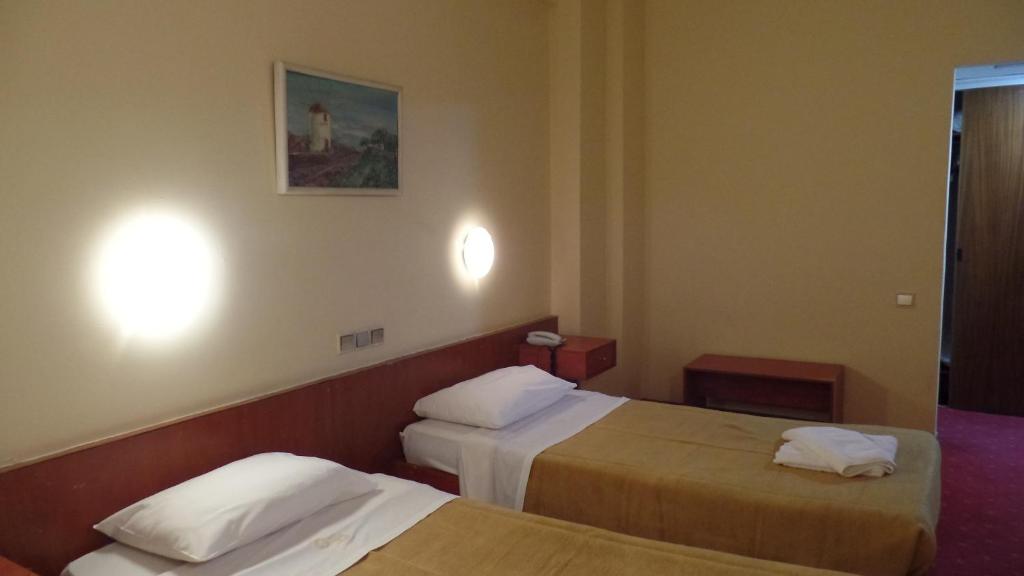 Postel nebo postele na pokoji v ubytování Cavo D' Oro