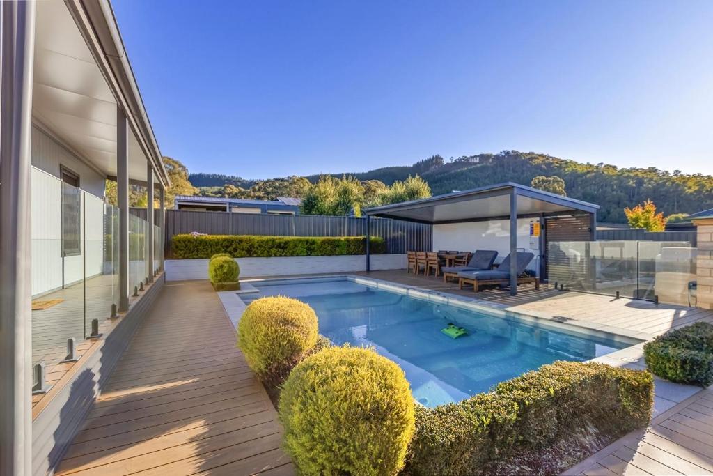 an image of a house with a swimming pool at Route 86 Bright in Bright
