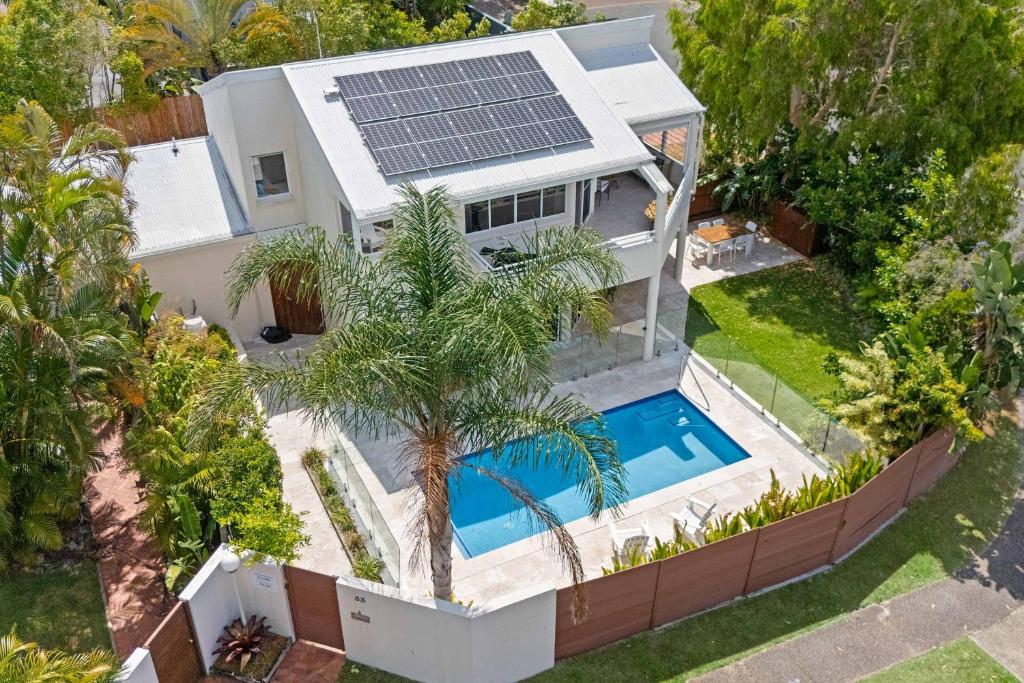an aerial view of a house with a swimming pool at Southwind in Sunrise in Sunrise Beach
