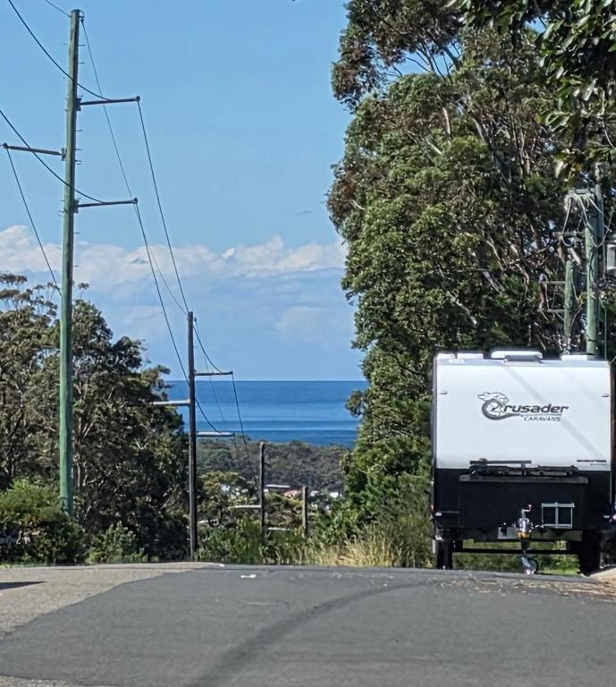 a truck parked on the side of a road at Quiet Homestay Ulladulla in Ulladulla