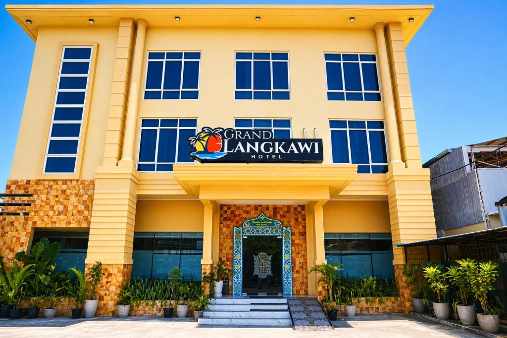 a building with the entrance to the campus of angkor university at Hotel Grand Langkawi By ZIRI in Lheue