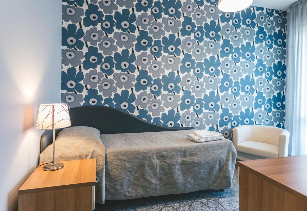 Postel nebo postele na pokoji v ubytování Hotel Principe Residence