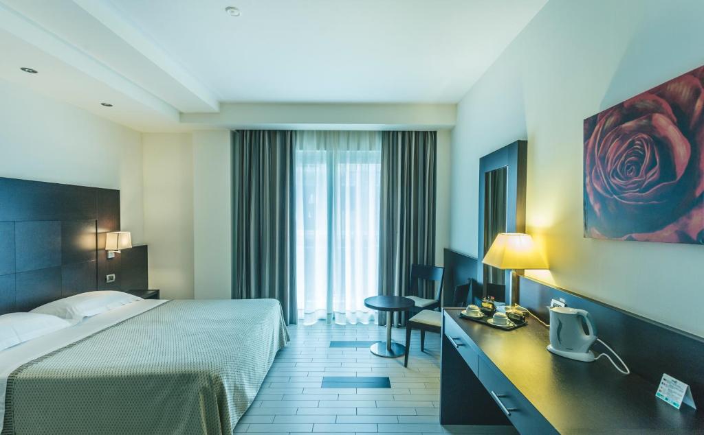Postel nebo postele na pokoji v ubytování Hotel Principe Residence