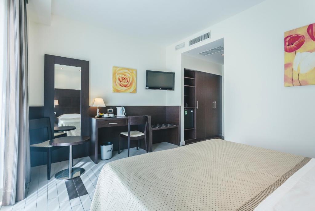 Postel nebo postele na pokoji v ubytování Hotel Principe Residence