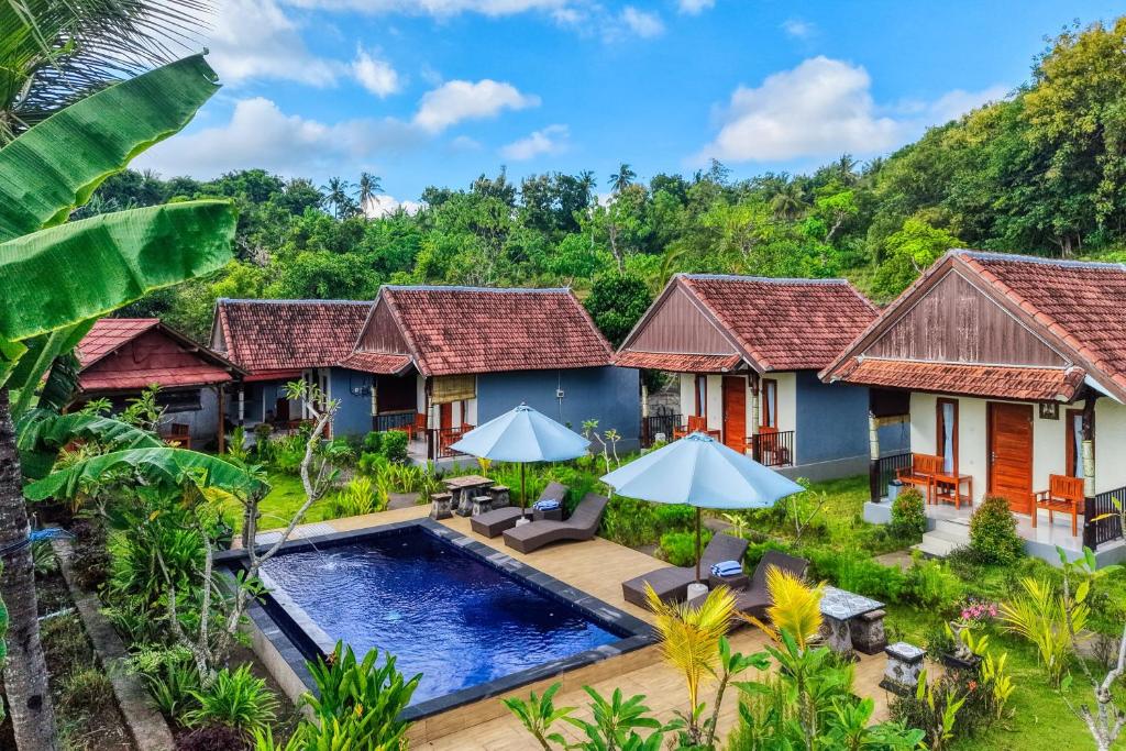 an aerial view of a resort with a swimming pool at Lungguh Penida Hut in Nusa Penida