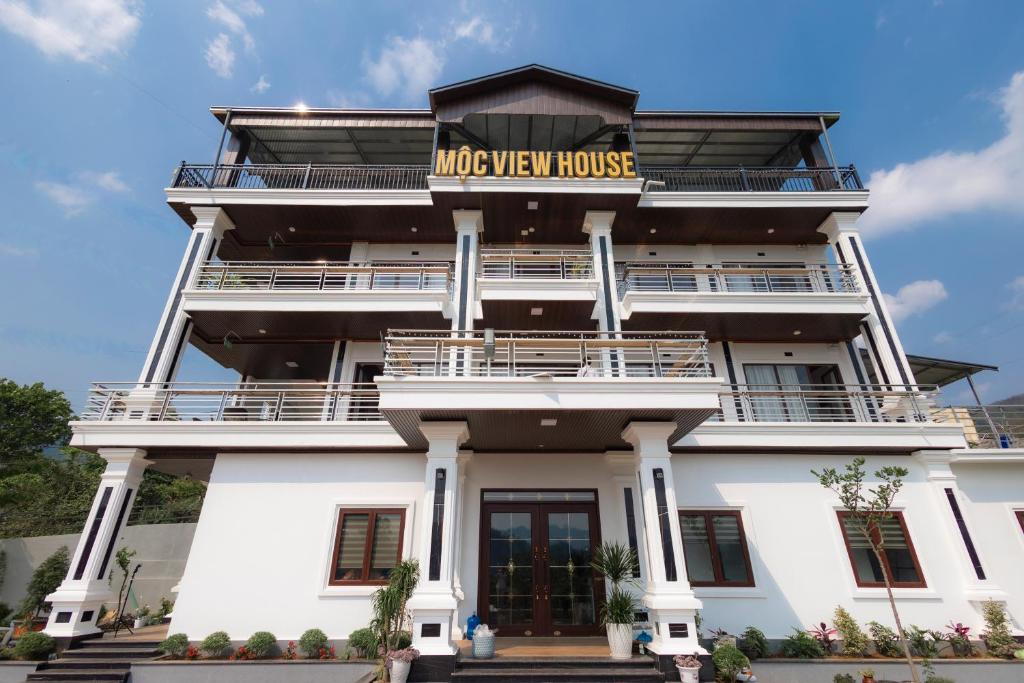 a building with a sign that reads morocco view house at Mộc View House in Mộc Châu