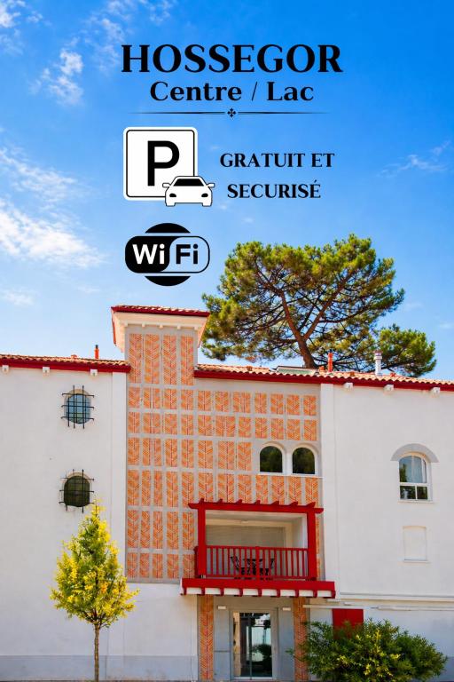 a building with a sign that reads hosp reception centre la at HOSSEGOR Plage & Golf in Hossegor