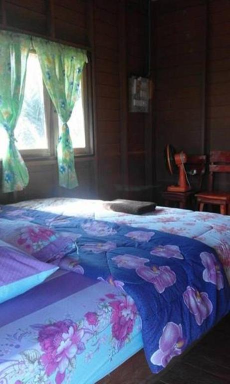 Postel nebo postele na pokoji v ubytování Lungcha Homestay