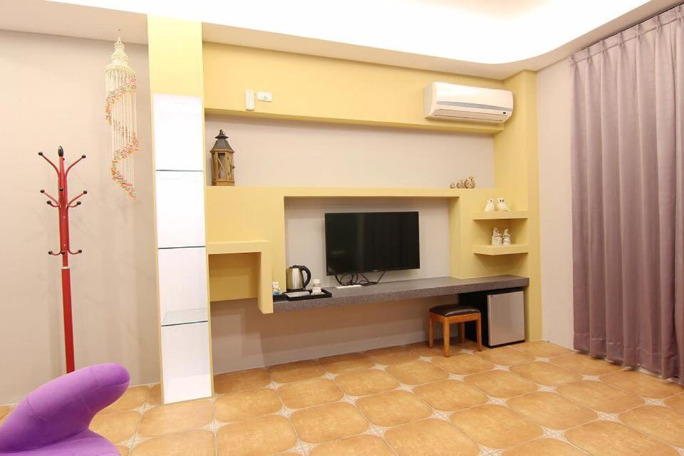 TV a/nebo společenská místnost v ubytování Zi Jìng Fang Inn