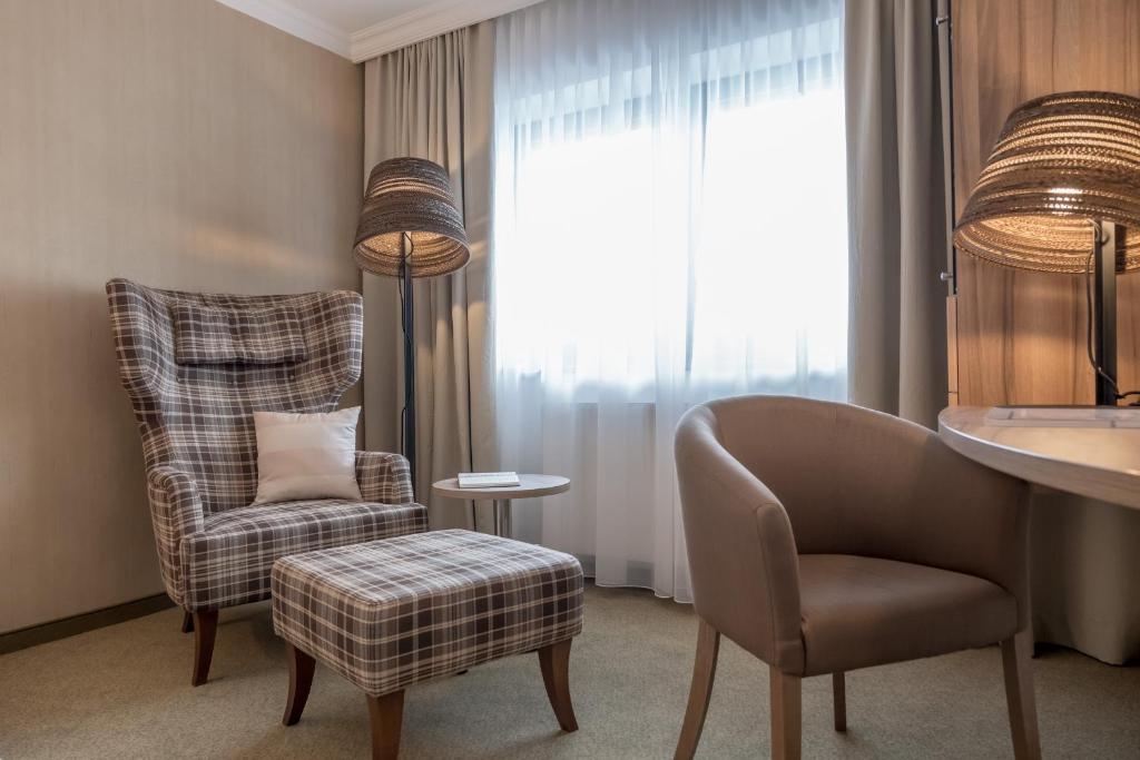 Posezení v ubytování Hotel Madeleine