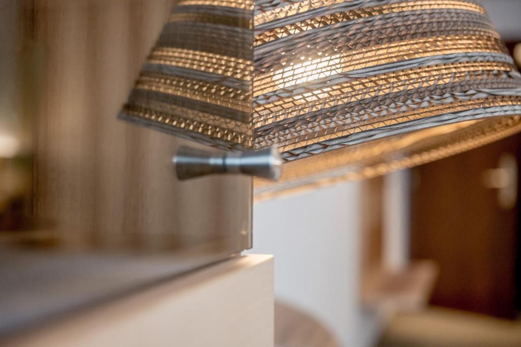Postel nebo postele na pokoji v ubytování Hotel Madeleine