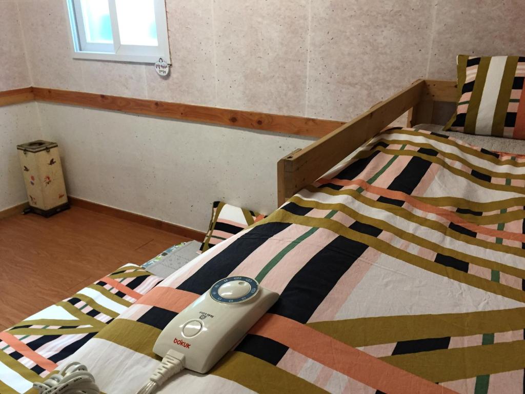 Postel nebo postele na pokoji v ubytování Dorandoran Guesthouse