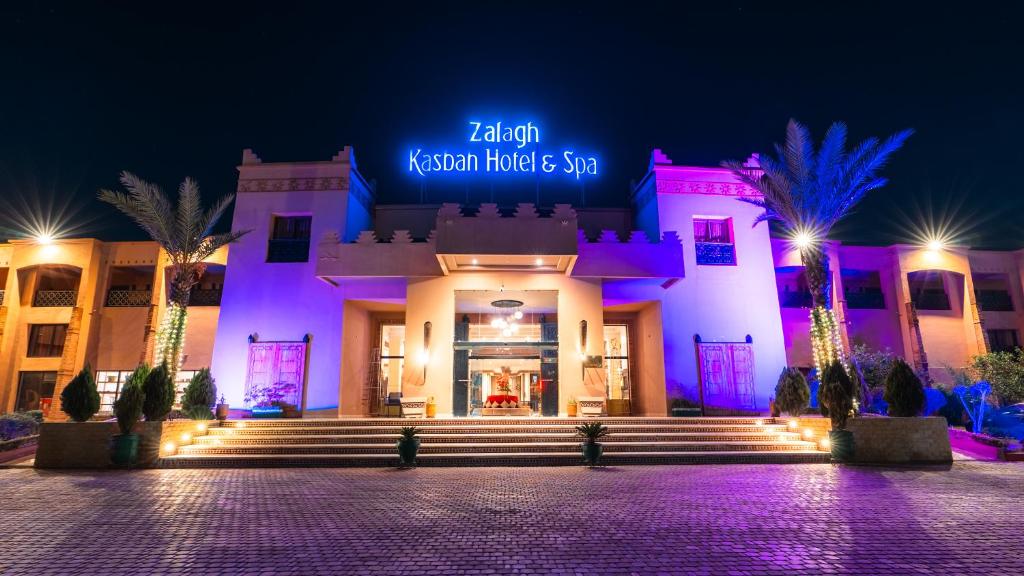 a building with a sign that reads afghan kiryani house and spa at Zalagh Kasbah Hotel & Spa in Marrakesh