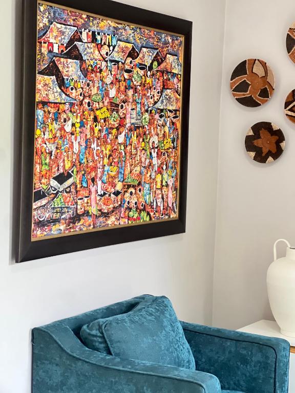 a picture of the all super heroes puzzle on a wall at 29 Village Place in Gaborone