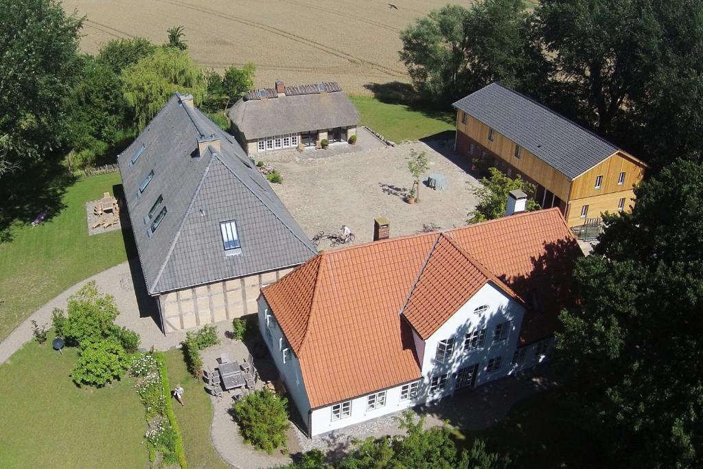 an aerial view of a house with orange roofs at Ostseehof-Kernhof in Pommerby