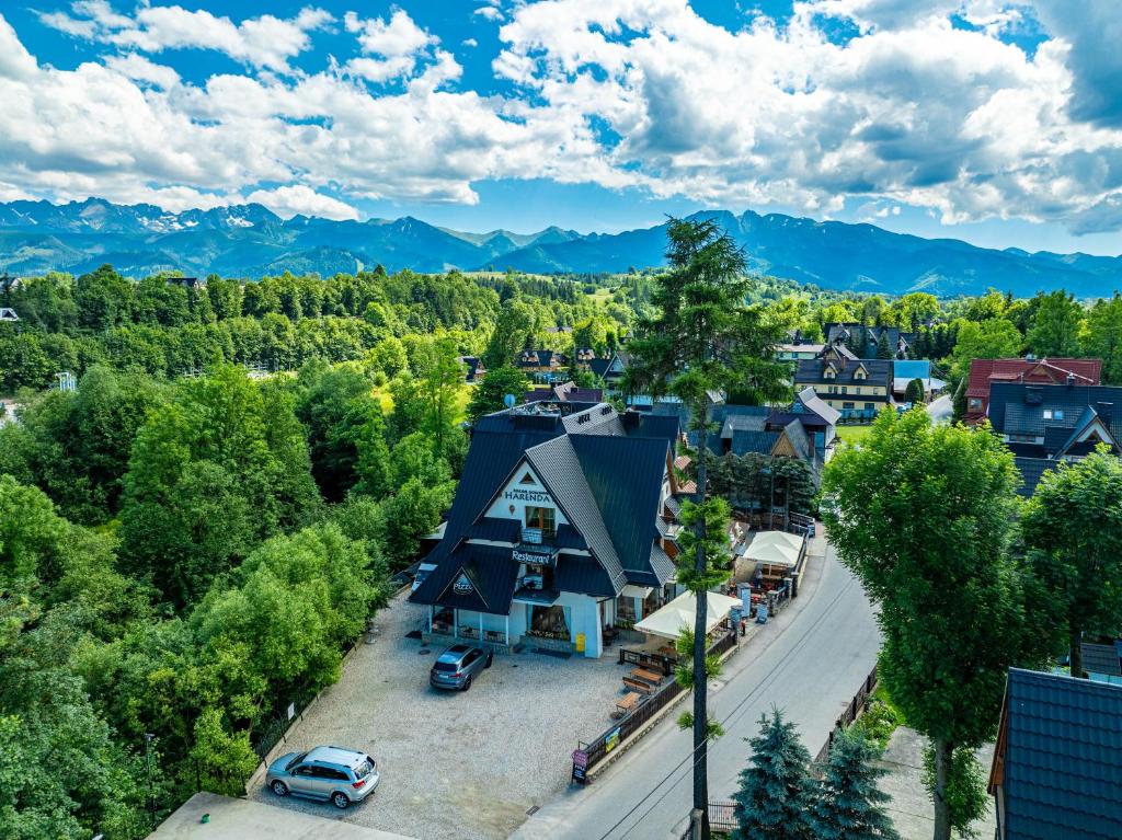 an aerial view of a small town with a house at Residence Spa Harenda in Zakopane
