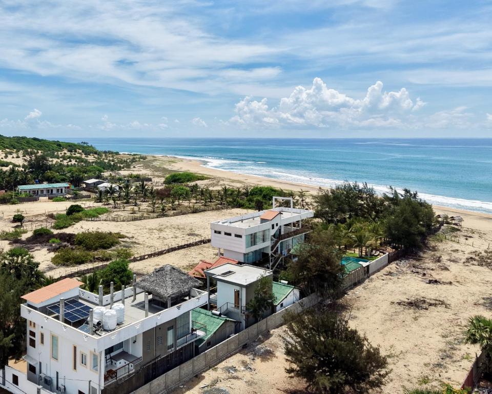 an aerial view of a house on the beach at Stay Golden in Arugam Bay