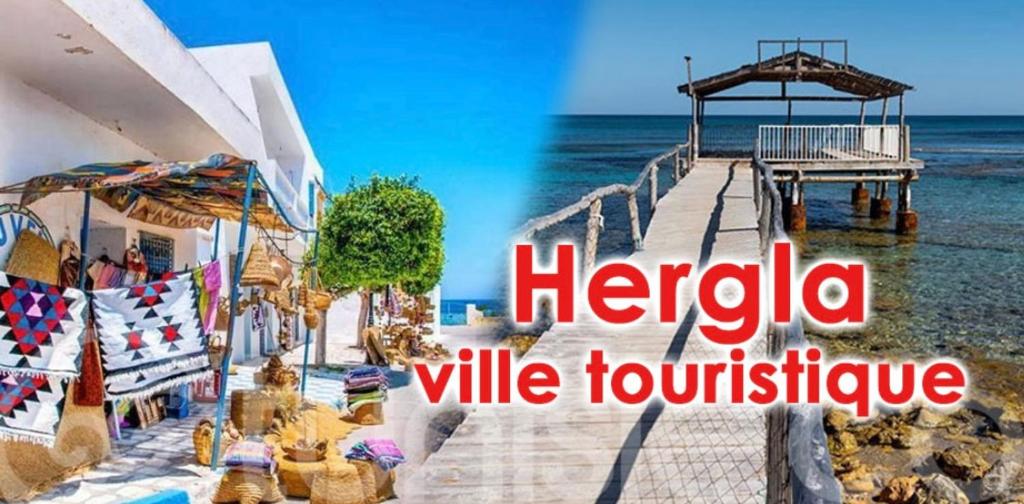 a sign that reads kerbia ville touigle on a pier at HERGLA Sousse Zone Touristique in Harqalah