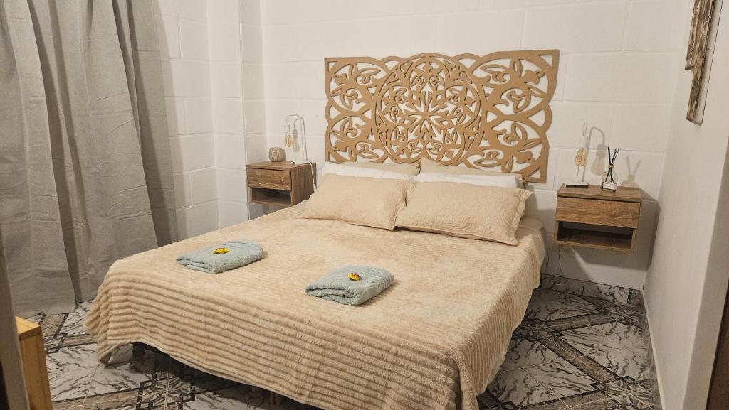 Llit o llits en una habitació de Refugio del Jagüel Dto Familiar Equipado Centro Munro Cerca Tecnópolis y River
