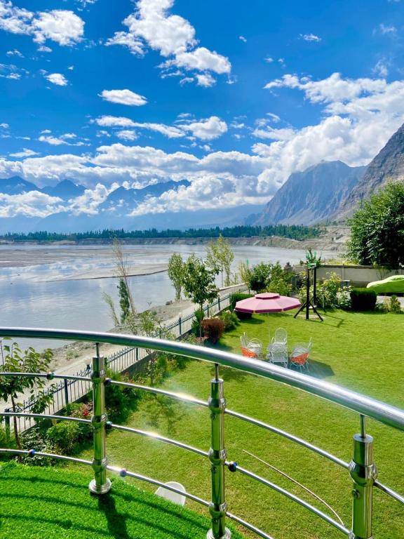 a view of the river from the balcony of a house at Hotel Blangsa Indus View in Skardu