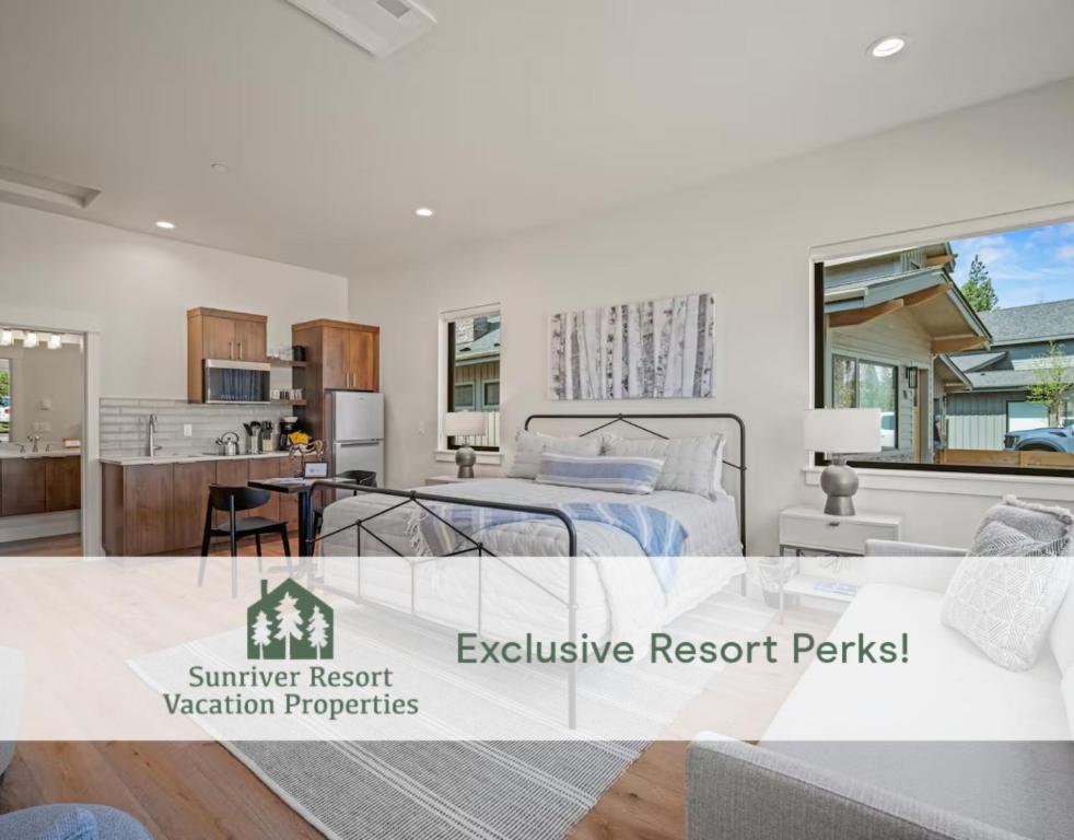 a large bedroom with a bed and a kitchen at 18221-2 Forestbrook Loop in Sunriver
