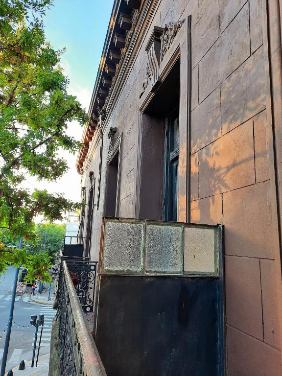 an open door of a building with a window at Balcones de Cabrera in Buenos Aires