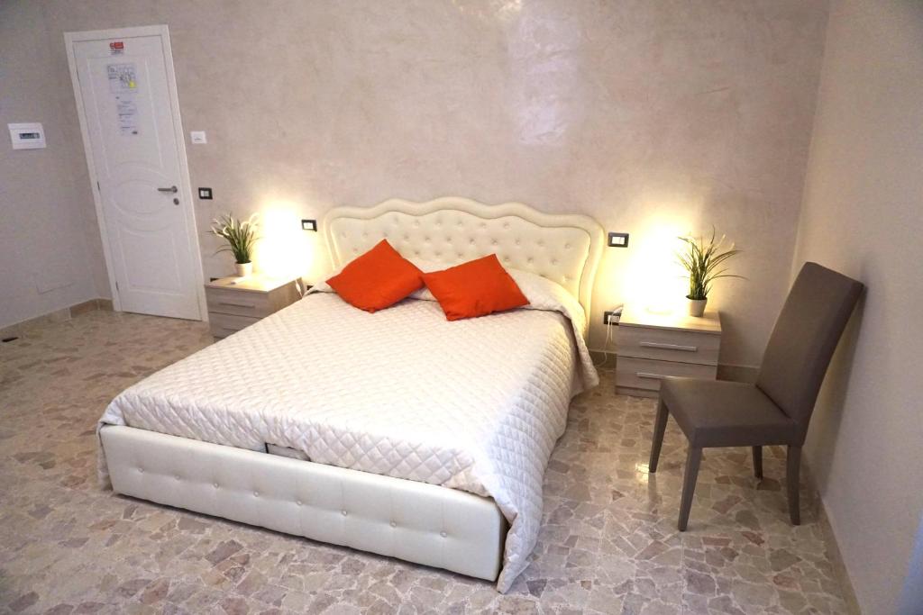 A bed or beds in a room at Residence Stendhal Guest House