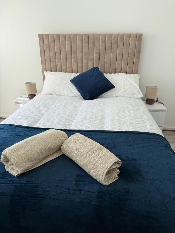a bed with two pillows on top of it at The cumbria place in Elswick