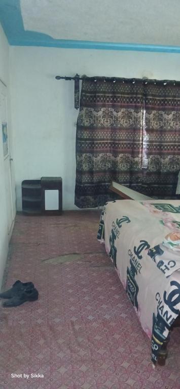 a bedroom with a bed in a room at James breazy hill in Sandy Bay