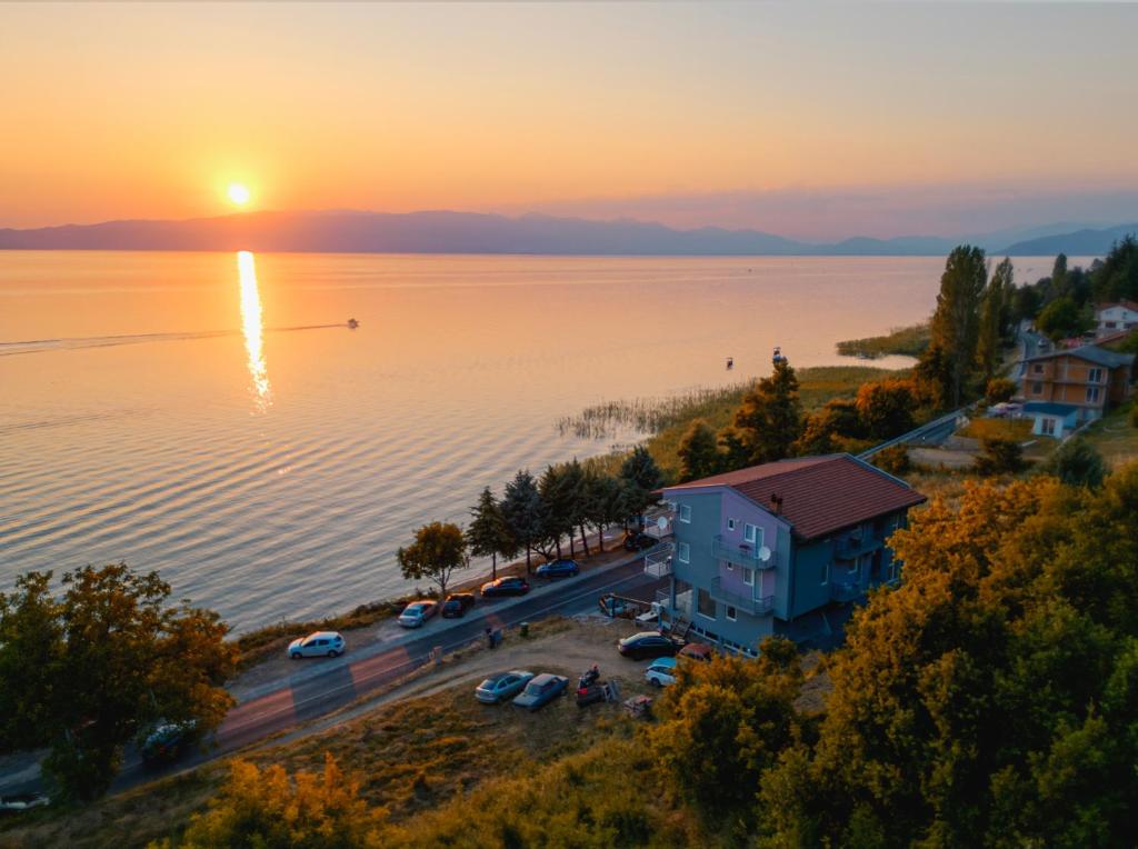 an aerial view of a lake at sunset at Villa Strmec in Peštani