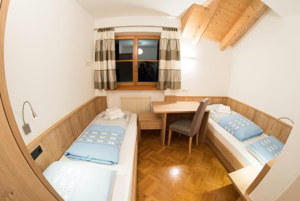Łóżko lub łóżka w pokoju w obiekcie Appartements Else