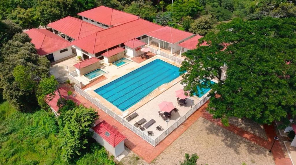 an overhead view of a house with a swimming pool at Acaymas Club in Ricaurte