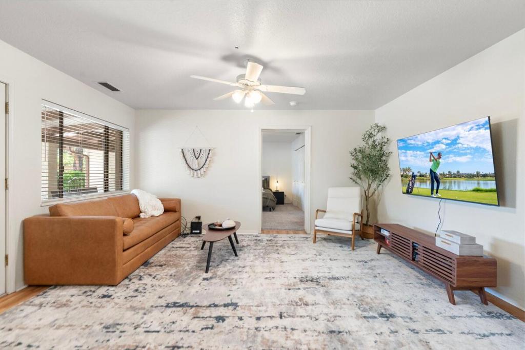 a living room with a couch and a ceiling fan at Sedona 2BR Near Trails & Shops in Sedona