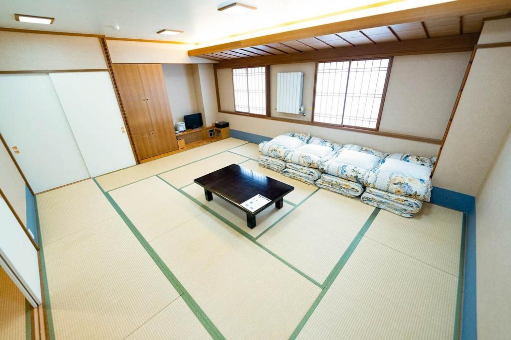 an overhead view of a living room with a couch and a table at Hashima - Hotel - Vacation STAY 52732v in Hashima