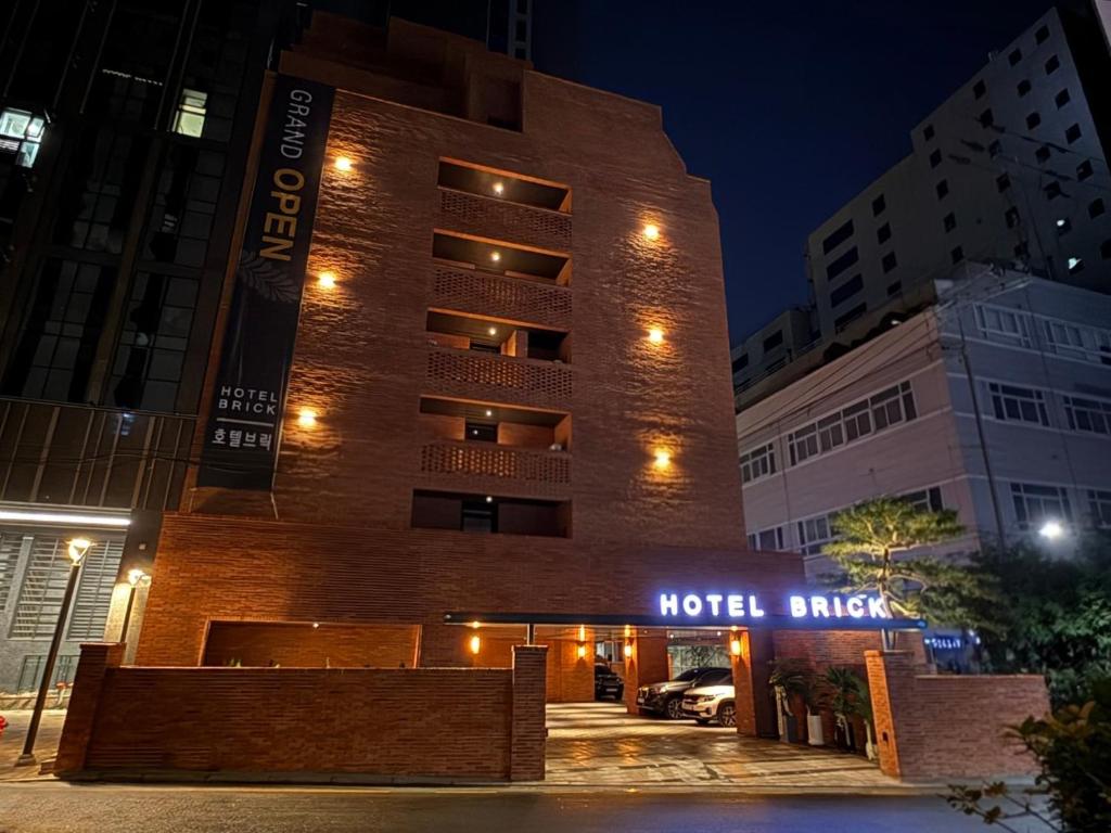 a hotel at night with a hotel brick building at 서초 Hotel Brick in Seoul