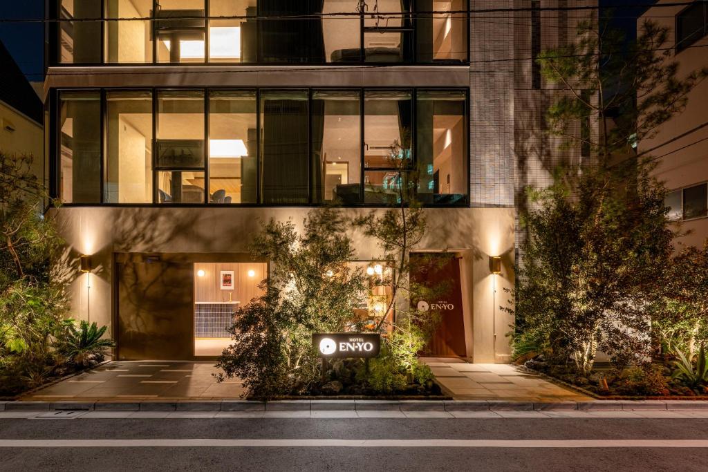 a building with a sign in front of it at Hotel EN-YO in Tokyo