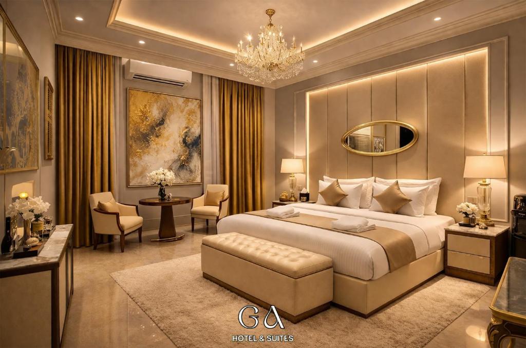 a bedroom with a large bed and a chandelier at GAP Cairo Hotel Downtown in Cairo