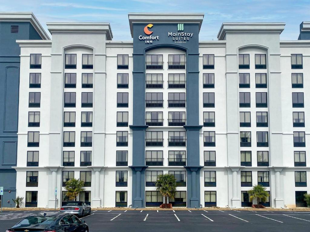 a large white building with a sign on it at Comfort Inn Conover-Hickory in Conover