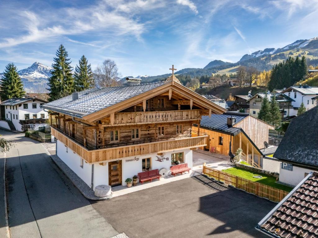 an overhead view of a house with a roof at Schwaigermühle Apartments - historic charm & modern comfort in Kirchberg in Tirol