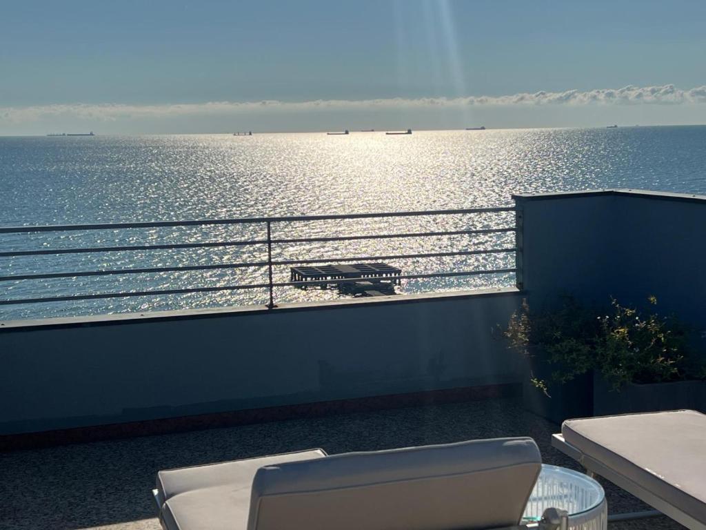 a balcony with a view of a body of water at Sea Tower Torre Telemetrica Lido di Venezia in Venice-Lido