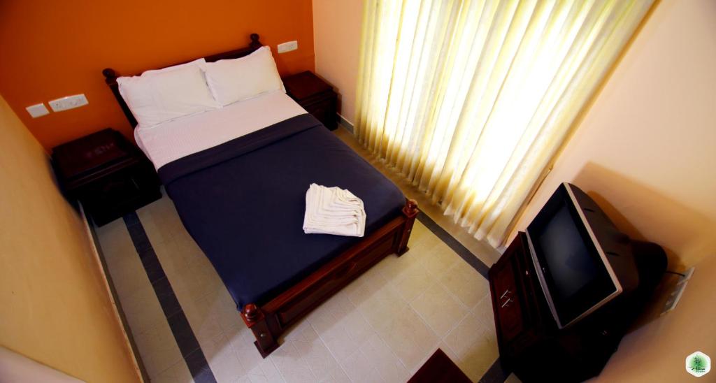 Postel nebo postele na pokoji v ubytování Hiliya Resort