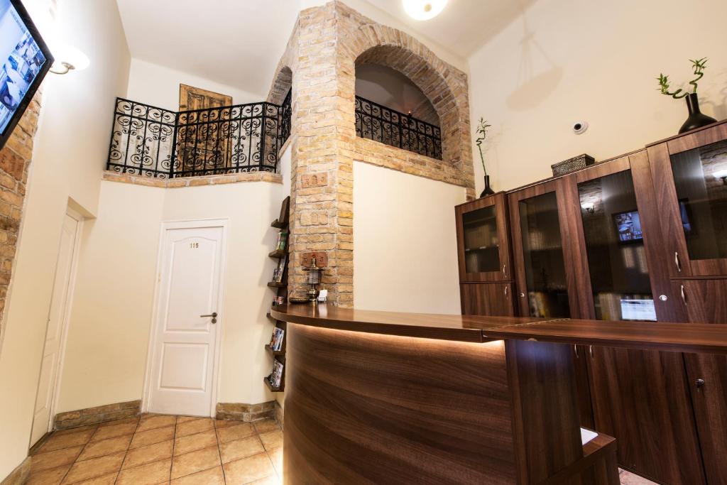 Televízia a/alebo spoločenská miestnosť v ubytovaní Centrooms House